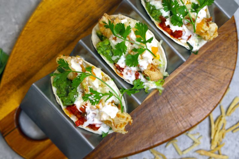 Chuys crispy chicken flautas with sour cream