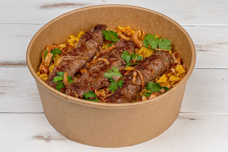 Chuys burrito bowl with rice beans and grilled protein